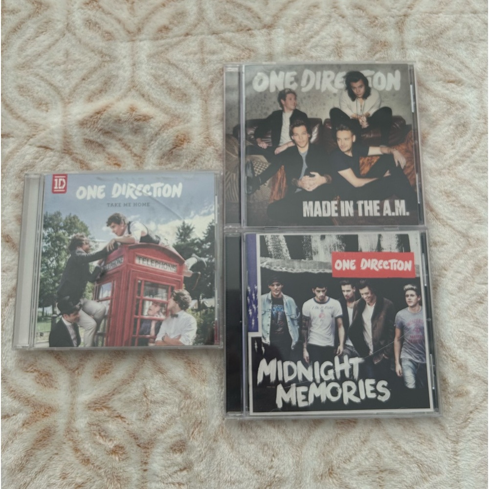 3 One Direction CD’s (Take me home, Midnight Memories, Made in the A.M).